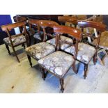 A set of twelve Victorian mahogany bar back dining chairs