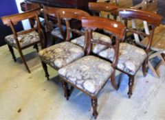 A set of twelve Victorian mahogany bar back dining chairs