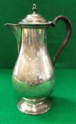 A Victorian silver baluster coffee pot (by John Aldwinckle and James Slater for Holland,