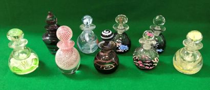 A collection of Caithness perfume bottles comprising "Zenith" No'd. 24/150, "Samarkand" No'd.