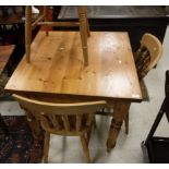 A modern pine square breakfast table,