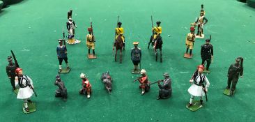 A collection of various Britains painted figures including Indian Lancers, Greek guards,
