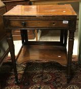 A late Regency mahogany work table with pop up mirror back (plate missing),