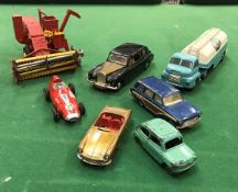 A box containing a collection of various model vehicles including Corgi Major Massey Ferguson 780