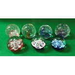 A collection of seven Caithness paperweights comprising "Reflections 91", "Reflections 93",
