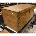 A 19th Century camphor wood campaign chest with brass bound corners and twin locks