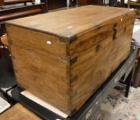 A 19th Century camphor wood campaign chest with brass bound corners and twin locks