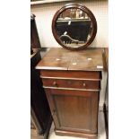 A Victorian mahogany gentleman's shaving stand with circular mirror over a two part rising top and
