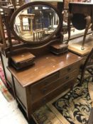 An Edwardian mahogany chest of three short over three long drawers,