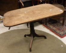 A 19th Century mahogany tilt top table with rectangular top raised on pedestal column to tripod