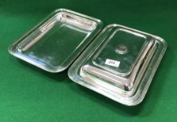 A pair of silver rounded rectangular vegetable tureens with reeded edge, together with one lid,