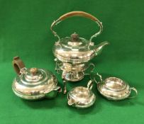 A George V silver three piece tea set of squat form with reeded decoration (by Robert Fead Mosley &