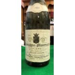 A box of mixed white wines comprising one bottle each of Chassagne Montrachet 1er Cru Les