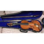Three various student violins,