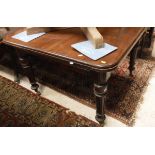 A circa 1900 mahogany extending dining table with single leaf