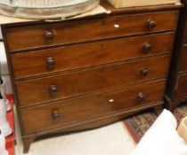 A Victorian mahogany square front chest of four graduating long drawers