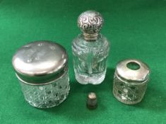 A cut glass and silver mounted dressing table scent bottle,