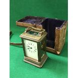 A 19th Century brass five glass carriage clock, the white enamel dial set with Roman numerals,