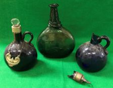 An early 19th Century glass bottle of moon flask form, with trail decoration to the neck,