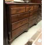 A 19th Century mahogany mule chest with rising top over five dummy drawers and four real drawers,