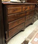 A 19th Century mahogany mule chest with rising top over five dummy drawers and four real drawers,