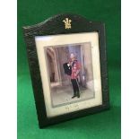 A framed and glazed photograph of Prince Charles in Military Uniform,