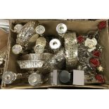 A box of various plated wares to include table candlesticks, bread baskets, glass table vases,