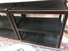 A pair of Colefax & Fowler side tables with studded decoration painted in black and red