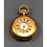 A ladies 18 carat gold cased half hunter pocket watch, the movement by J W Benson,