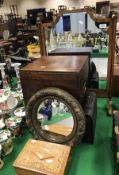 A walnut framed toilet mirror with brass finials, together with a 20th Century inlaid music box,