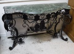 A wrought iron console table in the Roco