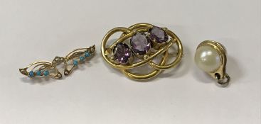 A Victorian pinchbeck and amethyst brooc