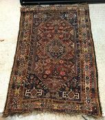 A Caucasian rug, the central panel set w