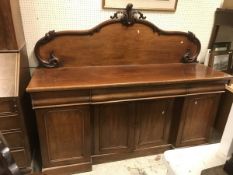 A Victorian mahogany sideboard with rais