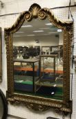 A giltwood and gesso framed wall mirror