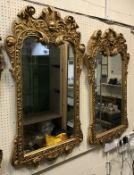 A pair of gilt framed mirrors with cheru