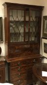 A Victorian mahogany and inlaid bureau b