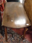 A 19th Century French walnut drop leaf d