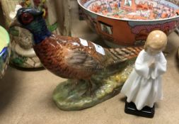 A Royal Doulton figure of a Pheasant (HN