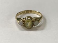 An 18 carat gold yellow sapphire and opa