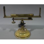 A late 19th century surveyor's level in clear varnished brass possibly of French origin,