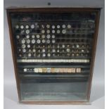 A late 19th/early 20th century mahogany glazed single door wall cabinet,
