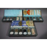 Three early 20th century sample cases each containing six bottles of Victory lozenges,