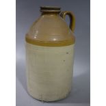 An early 20th century stoneware five gallon flagon with moulded strap handle,