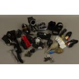 Miscellaneous camera accessories including straps, lens caps, cables, Pentax Camera Grip,