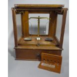 A set of pharmaceutical scales Class 1 to weigh 2oz by Goodbrand & Co,