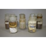 A set of five early 20th century apothecary's glass display jars,
