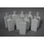 A set of ten white glass flask-shaped bottles, 15.