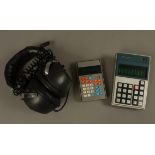 A Unisonic 1048 Calculator; a Prinstronic MC99 calculator;