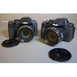 Nikon Coolpix P520 digital bridge cameras (2) both at fault